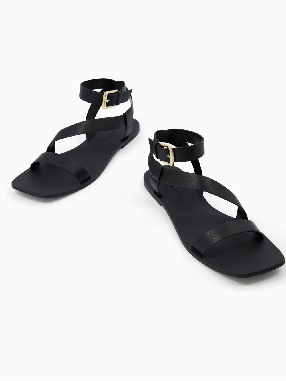 Flat sandals with ankle strap